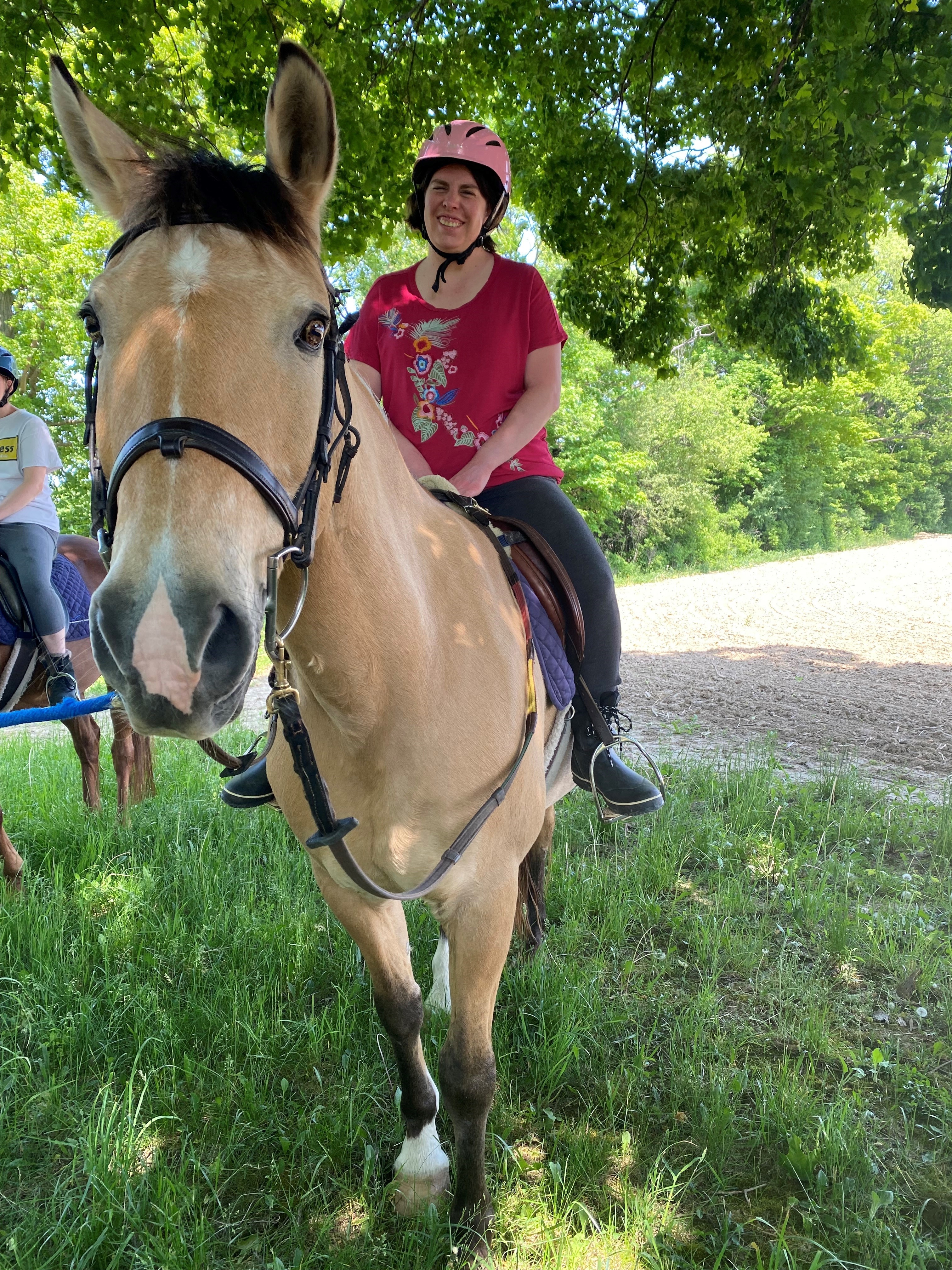 a participant riding Chase on our trails