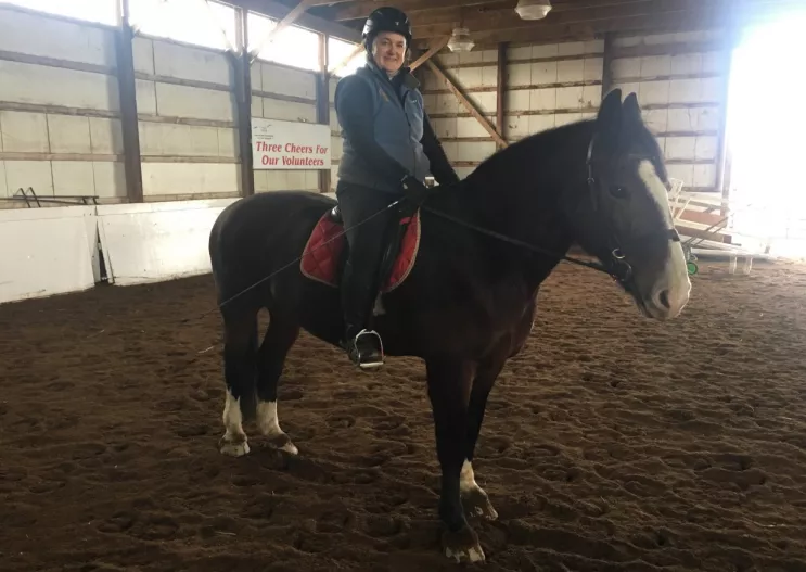 Our long-time volunteer, Sue, mounted on Willy. 